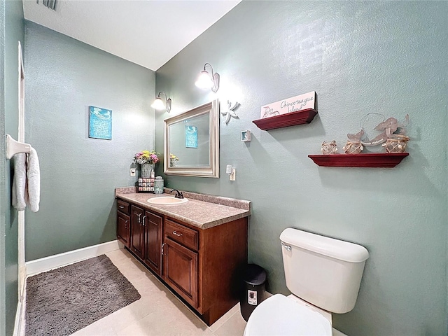 16224 Iola Woods Trl, Dade City, FL 33523 - bathroom with vanity, baseboards, and toilet