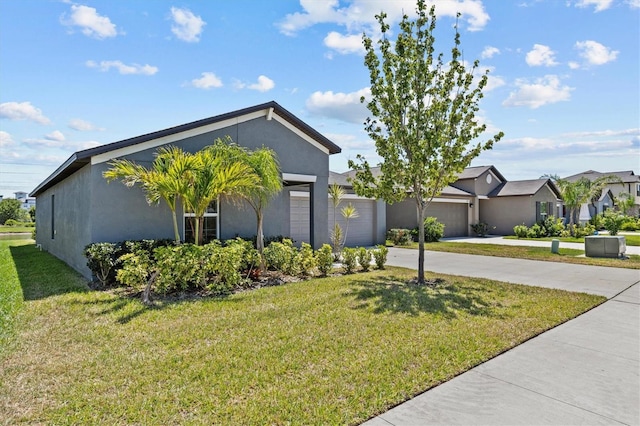 view of front facade featuring stucco siding, concrete driveway, a front lawn, and a garage
