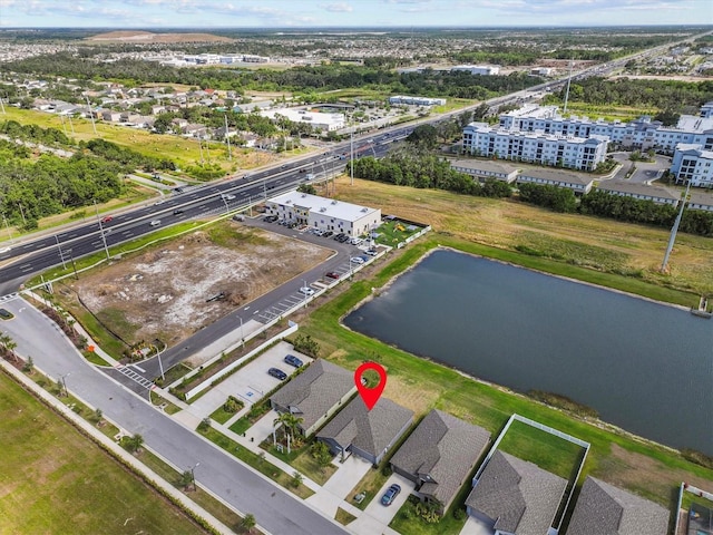 drone / aerial view with a water view