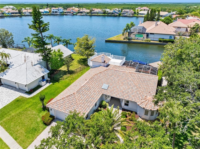 aerial view featuring a water view and a residential view