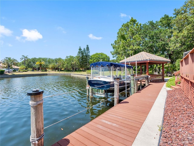view of dock featuring a water view and boat lift