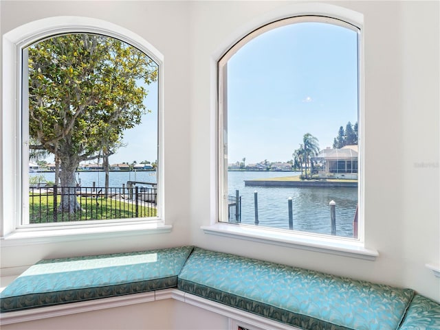 unfurnished room with a water view