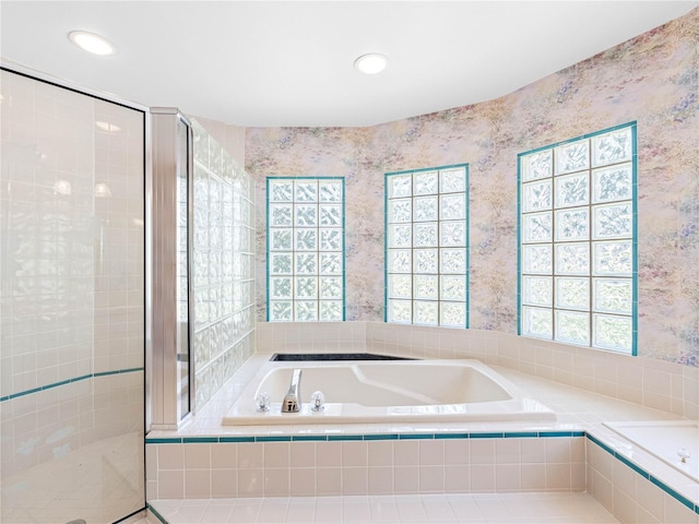 full bathroom with a garden tub, a shower stall, wallpapered walls, and recessed lighting