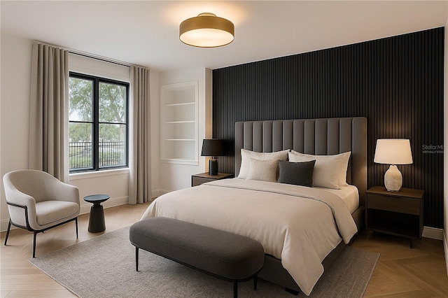 bedroom featuring baseboards