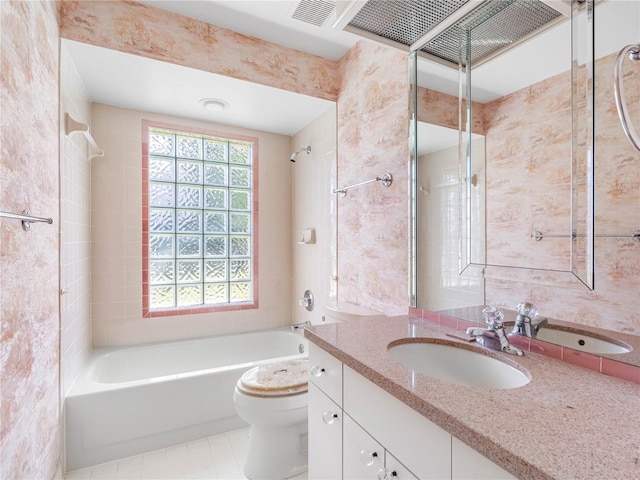 bathroom with toilet, bathtub / shower combination, vanity, and visible vents