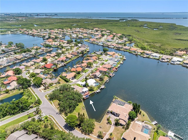 aerial view featuring a water view and a residential view