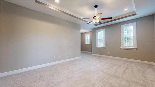 3615 S Church Ave, Tampa, FL 33629 - spare room featuring a tray ceiling, ornamental molding, baseboards, light colored carpet, and recessed lighting