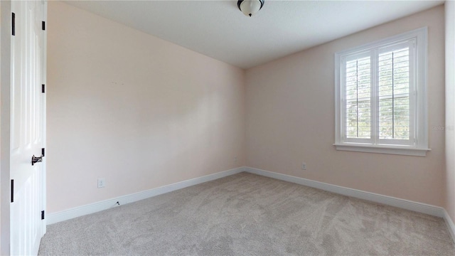 3615 S Church Ave, Tampa, FL 33629 - spare room with light colored carpet and baseboards