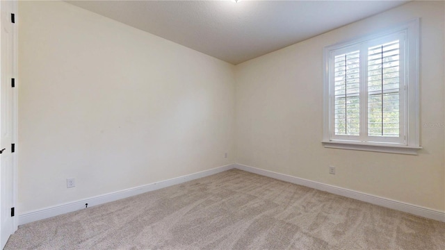 3615 S Church Ave, Tampa, FL 33629 - spare room with light colored carpet and baseboards