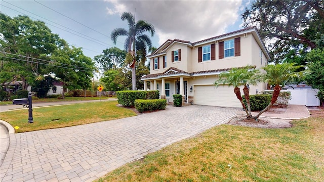 3615 S Church Ave, Tampa, FL 33629 - view of front of home with decorative driveway, a garage, a tiled roof, and stucco siding