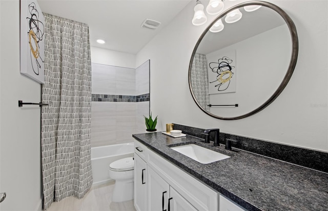 5949 Bluestar Ct, Lakewood Ranch, FL 34211 - bathroom with visible vents, vanity, toilet, recessed lighting, and tub / shower combination