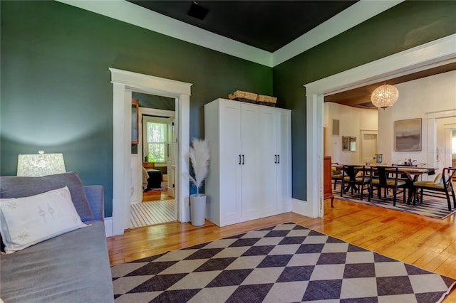 6341 Discovery Ln, Land O Lakes, FL 34638 - entrance foyer featuring hardwood / wood-style flooring, a chandelier, and baseboards