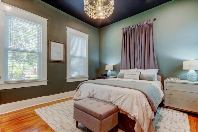 6341 Discovery Ln, Land O Lakes, FL 34638 - bedroom featuring wood finished floors and baseboards