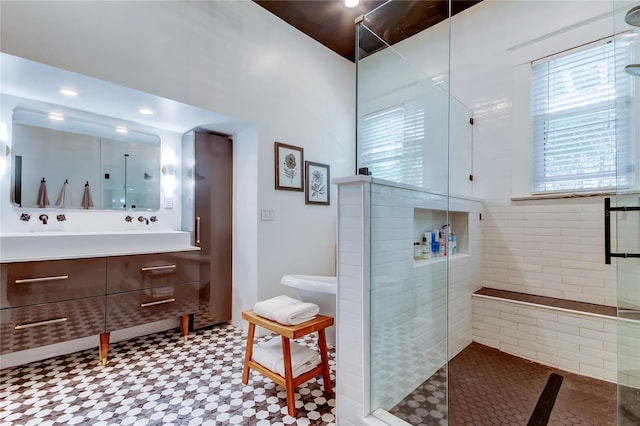 6341 Discovery Ln, Land O Lakes, FL 34638 - bathroom featuring a stall shower, tile patterned floors, and vanity