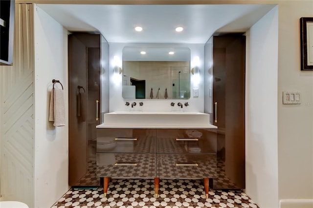 6341 Discovery Ln, Land O Lakes, FL 34638 - bathroom featuring toilet, vanity, a shower with door, and recessed lighting