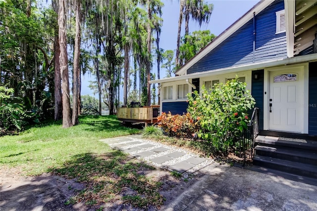 6341 Discovery Ln, Land O Lakes, FL 34638 - view of green lawn featuring a deck