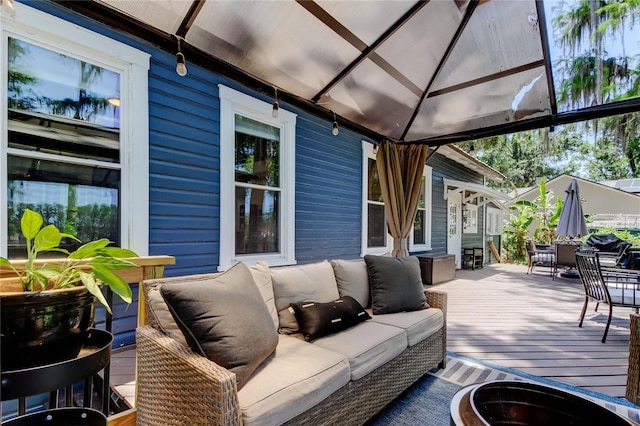 6341 Discovery Ln, Land O Lakes, FL 34638 - wooden deck featuring an outdoor living space and outdoor dining area