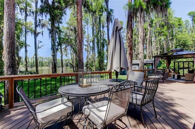 6341 Discovery Ln, Land O Lakes, FL 34638 - deck featuring a gazebo, outdoor dining area, and a water view