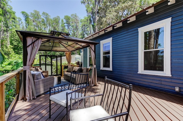 6341 Discovery Ln, Land O Lakes, FL 34638 - wooden deck featuring an outdoor hangout area and a gazebo