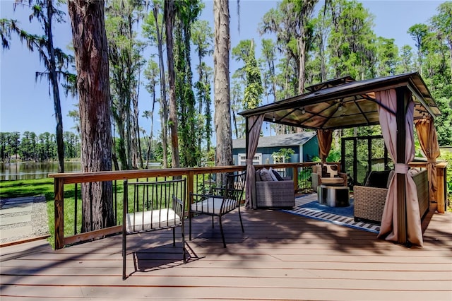 6341 Discovery Ln, Land O Lakes, FL 34638 - deck featuring a gazebo, view of wooded area, and a water view
