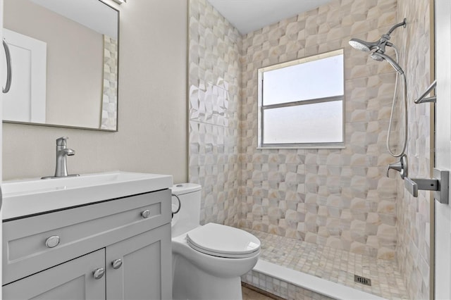 12400 Park Blvd Unit 210, Seminole, FL 33772 - full bath featuring vanity, toilet, and tiled shower