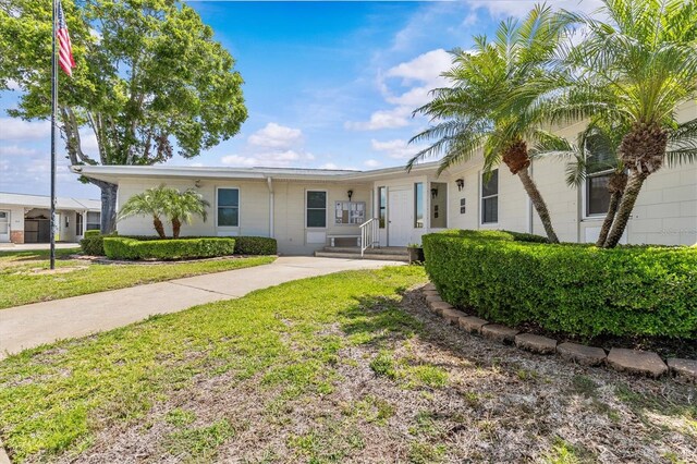 12400 Park Blvd Unit 210, Seminole, FL 33772 - ranch-style house with a front lawn