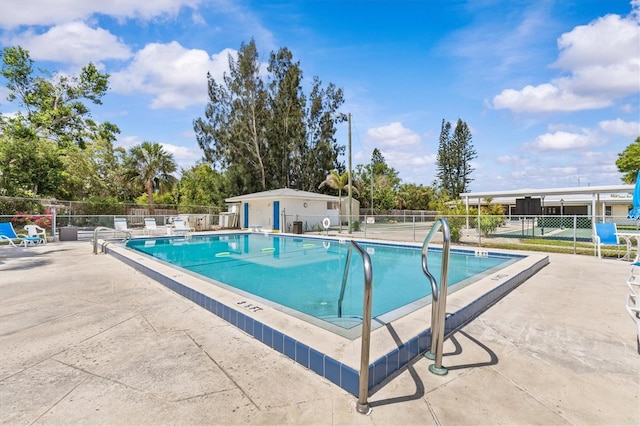 12400 Park Blvd Unit 210, Seminole, FL 33772 - pool with a patio and fence