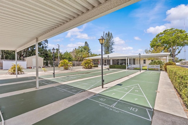 12400 Park Blvd Unit 210, Seminole, FL 33772 - view of community with fence and shuffleboard