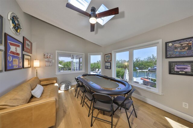 945 Bunker View Dr, Apollo Beach, FL 33572 - rec room with a ceiling fan, baseboards, vaulted ceiling, and light wood-style flooring