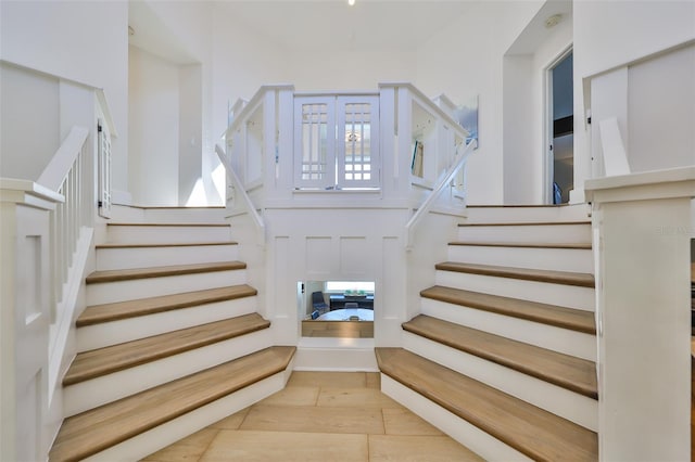 945 Bunker View Dr, Apollo Beach, FL 33572 - staircase featuring wood finished floors