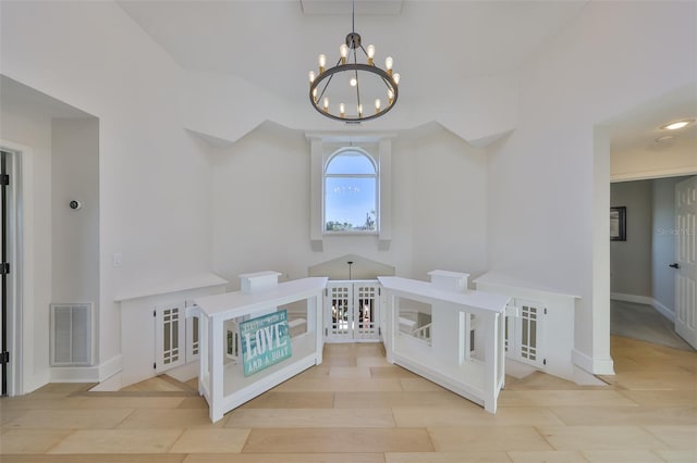 945 Bunker View Dr, Apollo Beach, FL 33572 - interior space with an inviting chandelier, baseboards, french doors, and visible vents