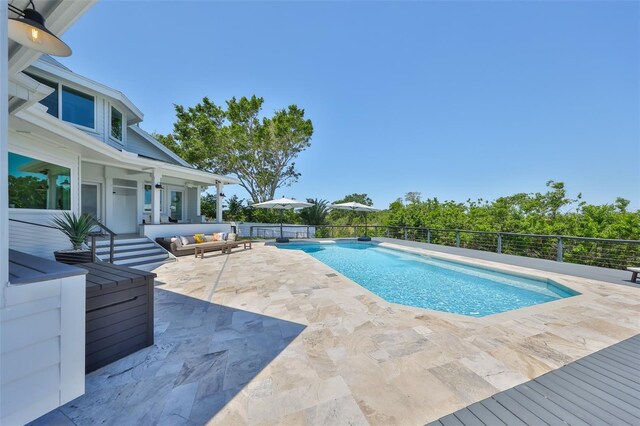 945 Bunker View Dr, Apollo Beach, FL 33572 - view of swimming pool with a fenced in pool, a patio, and an outdoor living space