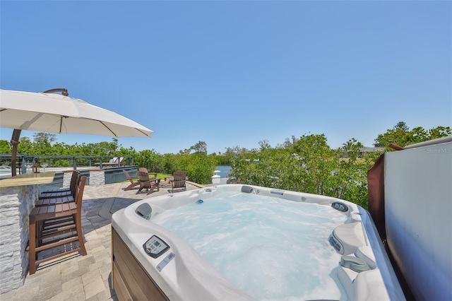 945 Bunker View Dr, Apollo Beach, FL 33572 - view of patio featuring a hot tub