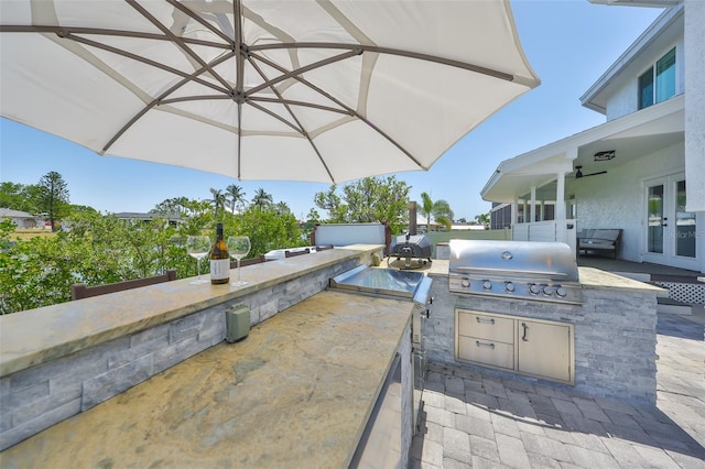 945 Bunker View Dr, Apollo Beach, FL 33572 - view of patio featuring area for grilling, french doors, and a grill