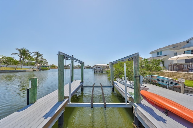 945 Bunker View Dr, Apollo Beach, FL 33572 - view of dock featuring a water view and boat lift