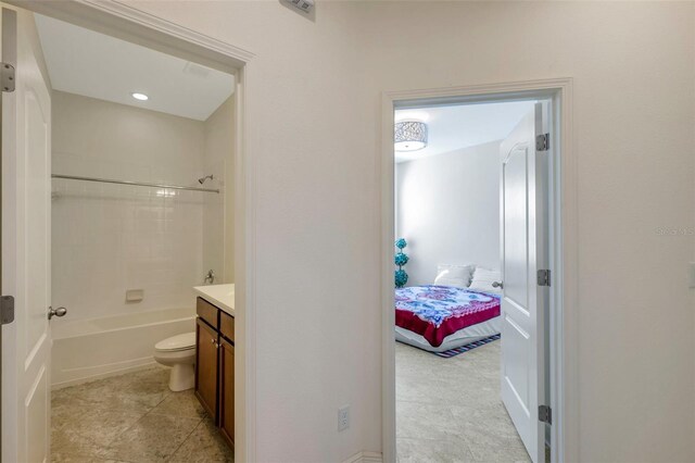 bathroom with vanity, visible vents, shower / tub combination, tile patterned floors, and ensuite bath