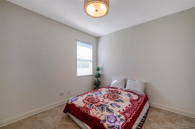 bedroom with baseboards