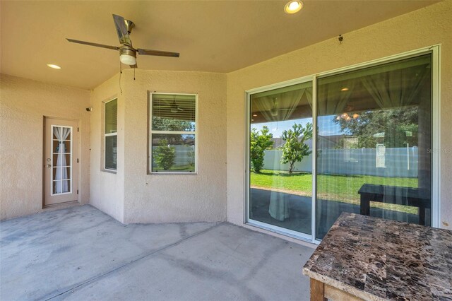 view of patio / terrace with a ceiling fan