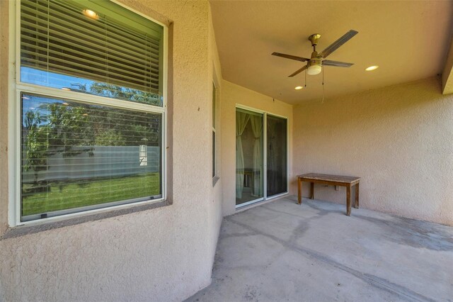 view of patio with ceiling fan