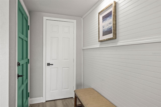 12700 5th Isle, Hudson, FL 34667 - mudroom featuring dark wood-style flooring