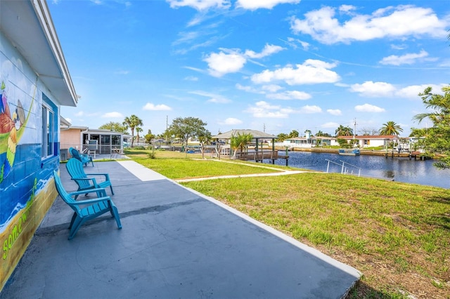 12700 5th Isle, Hudson, FL 34667 - view of grassy yard with a water view and a residential view