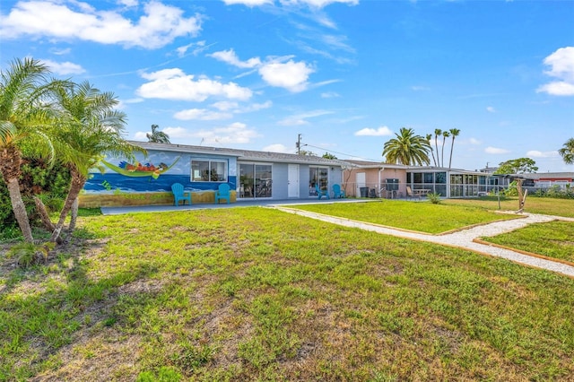 12700 5th Isle, Hudson, FL 34667 - view of front of house featuring a patio and stucco siding
