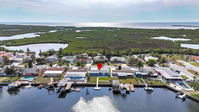 12700 5th Isle, Hudson, FL 34667 - aerial perspective of suburban area featuring a nearby body of water
