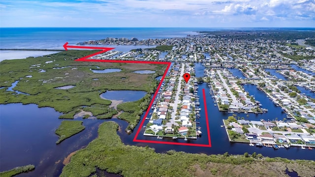 12700 5th Isle, Hudson, FL 34667 - aerial overview of property's location with a large body of water and property parcel outlined