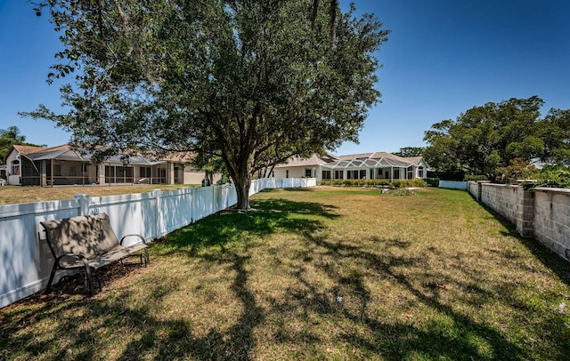 view of yard featuring fence