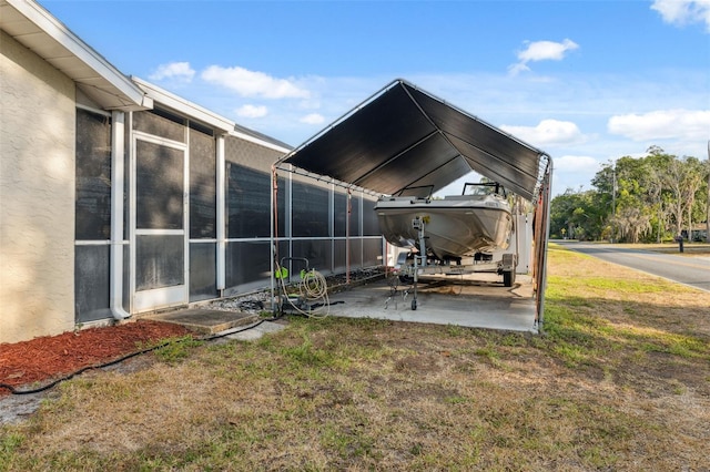 view of yard with a carport