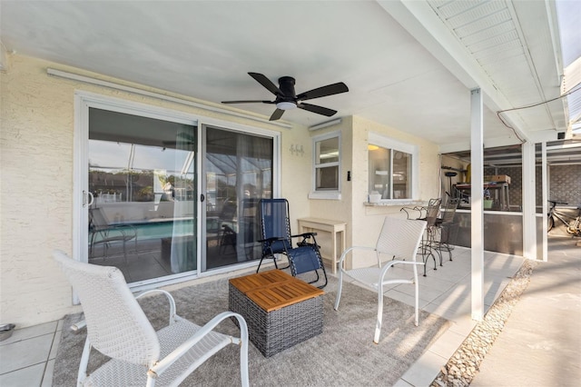 view of patio with ceiling fan