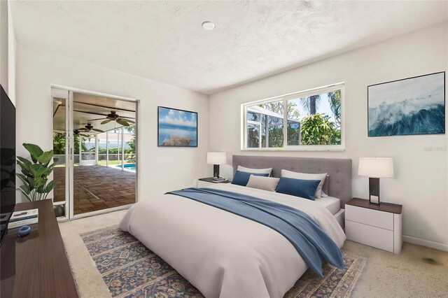 1141 80th Street Ct S, Saint Petersburg, FL 33707 - bedroom featuring access to exterior, multiple windows, and baseboards