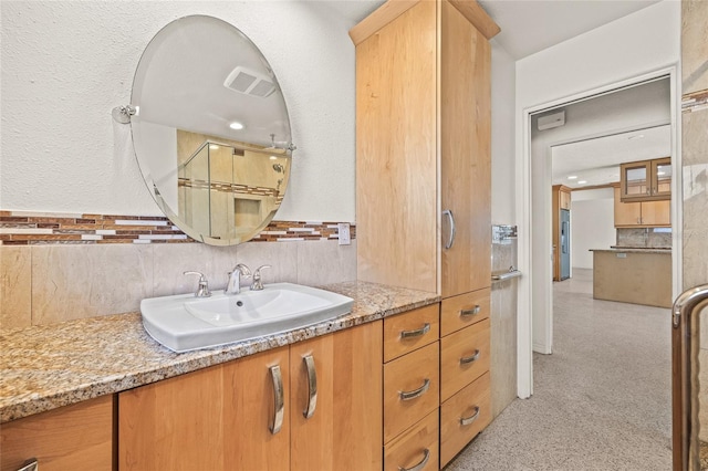 1141 80th Street Ct S, Saint Petersburg, FL 33707 - full bath featuring vanity and decorative backsplash