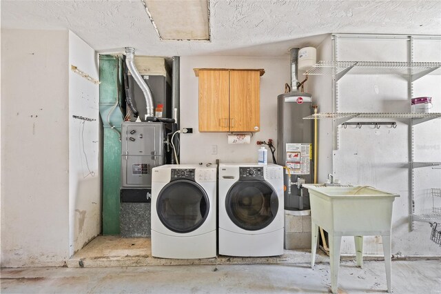 1141 80th Street Ct S, Saint Petersburg, FL 33707 - laundry area featuring gas water heater and washing machine and clothes dryer